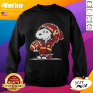 Alt Text: Snoopy in a hoodie featuring Washington Commanders, smiling at fans while wearing a stylish sweatshirt.