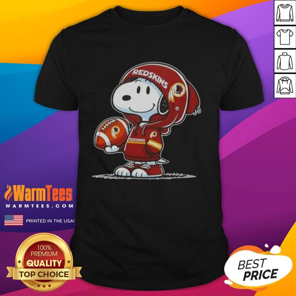 Alt Text: Snoopy in a hoodie, smiling at fans, wearing a Washington Commanders t-shirt, perfect for peanuts lovers.