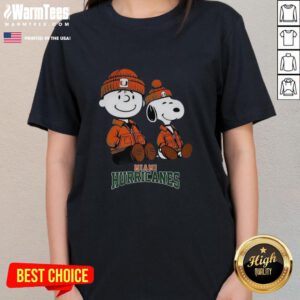 Alt Text: Awesome Charlie Brown and Snoopy Miami Hurricanes ladies tee featuring vibrant graphics and a stylish fit for fans.