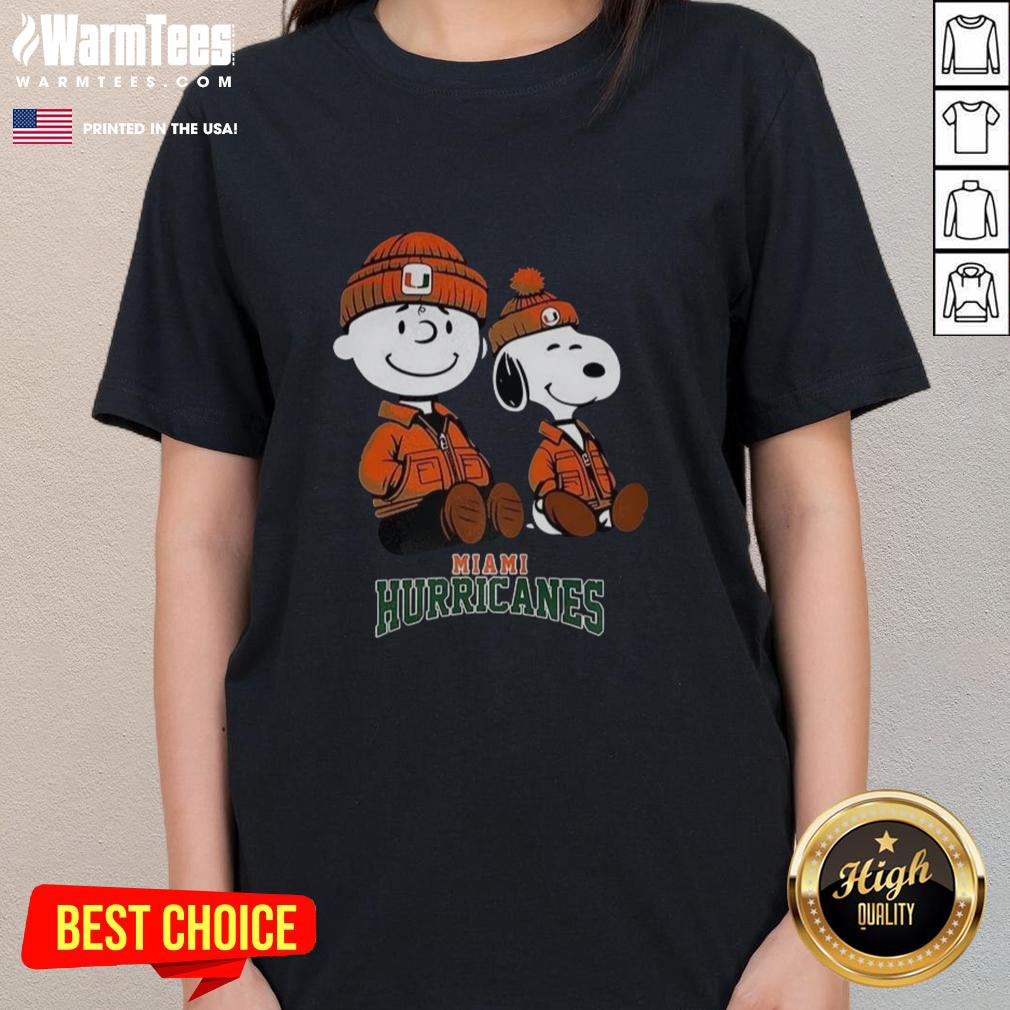 Alt Text: Awesome Charlie Brown and Snoopy Miami Hurricanes ladies tee featuring vibrant graphics and a stylish fit for fans.