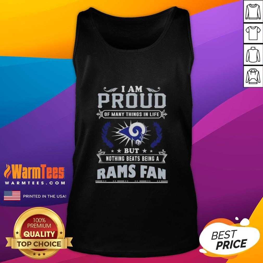 Los Angeles Rams fan proudly wearing a tank top that says 'Good I Am Proud Of Many Things In Life' at a game.