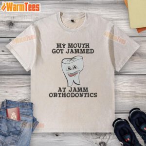 Leslie Knope wearing a washed T-shirt at Jamm Orthodontics, showcasing her humorous experience with braces.