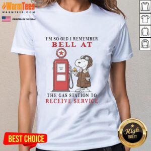 Snoopy graphic tee featuring nostalgic text about old gas station service bells, perfect for vintage cartoon fans.