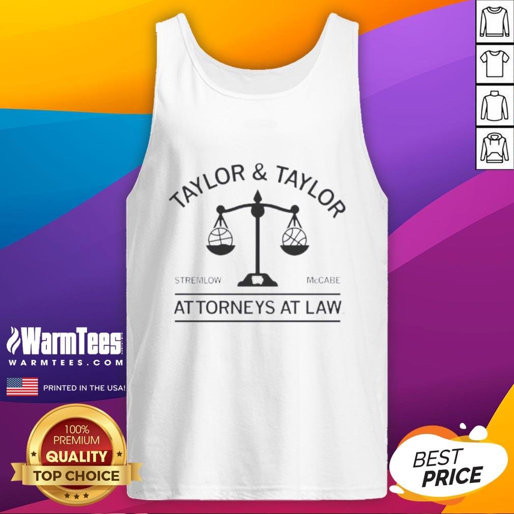 Good Taylor and Taylor Attorneys at Law team in stylish tank tops, showcasing professionalism and camaraderie.