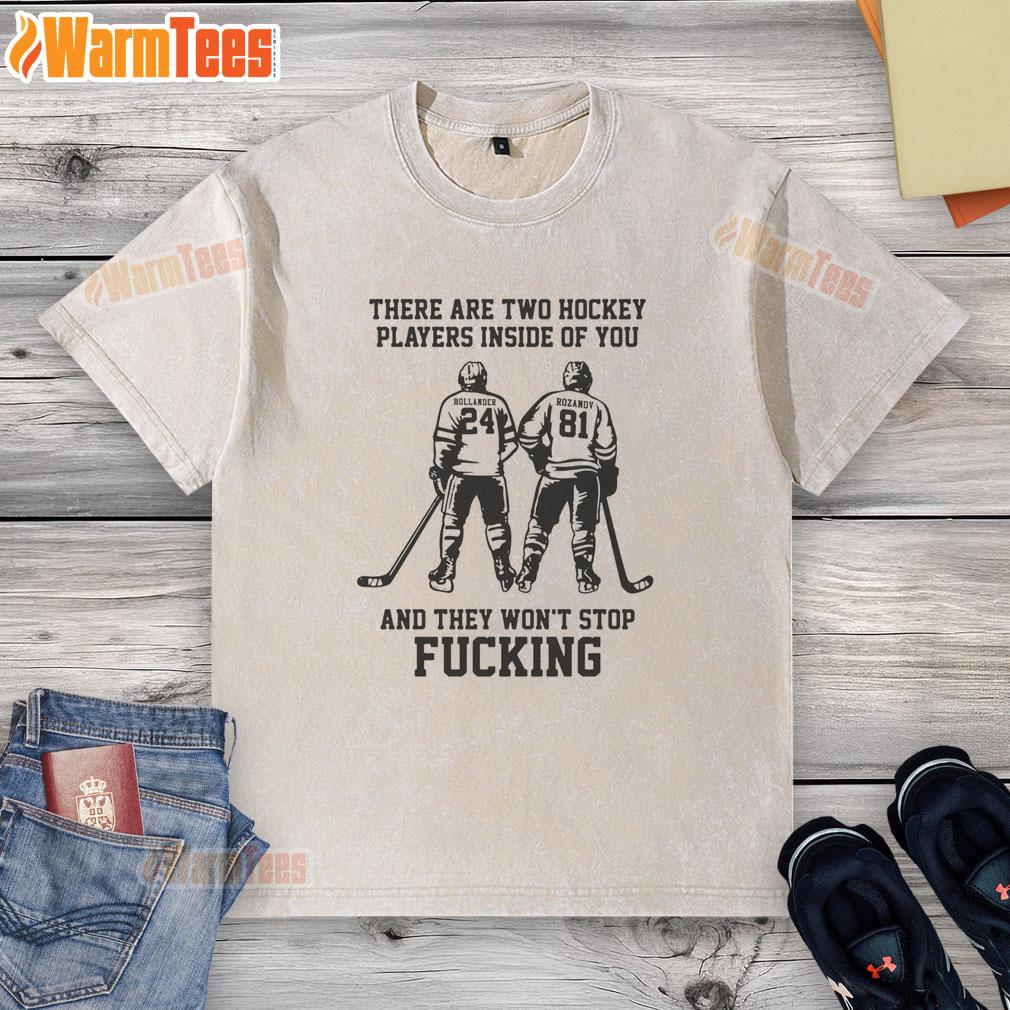 Funny washed t-shirt featuring 'Two Hockey Players Inside You' graphic, perfect for hockey fans and casual wear.