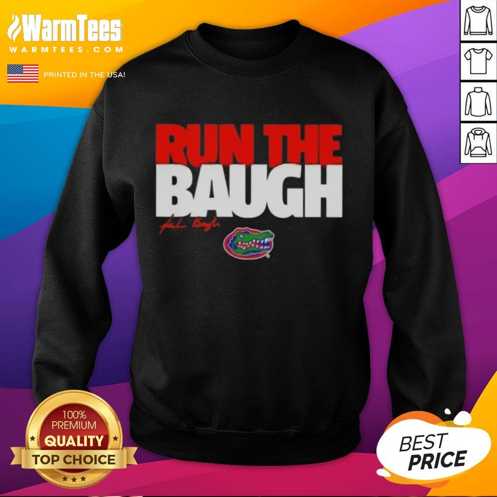 Jaden Baugh runs with the ball in a Florida Gators sweatshirt, showcasing team spirit and athleticism on the field.