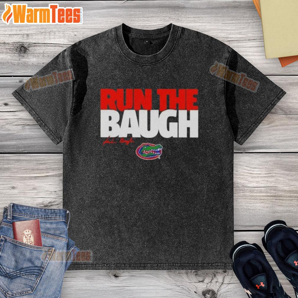 Alt Text: Jaden Baugh runs in a Nice Florida Gators football t-shirt, showcasing his signature style during a game.