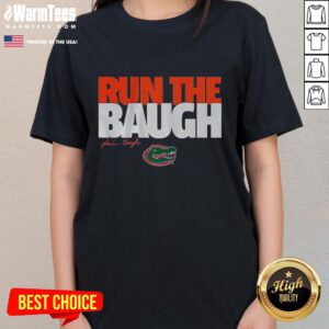 Alt Text: Jadan Baugh running in a Florida Gators Ladies Tee, showcasing team spirit and style during a game day event.