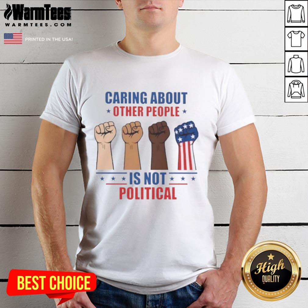 Alt Text: Top Caring About Other People Is Not Political Fists T-Shirt featuring bold text design on a stylish shirt.