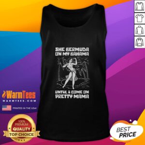Woman wearing Awesome She Bermuda tank top on the beach, showcasing trendy summer fashion and vibrant colors.