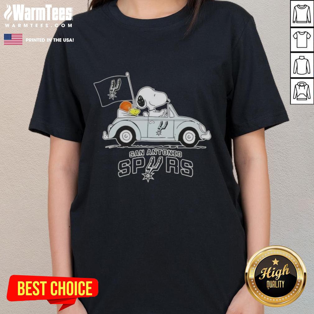 Alt Text: Snoopy driving a car in a San Antonio Spurs basketball themed ladies tee, perfect for sports fans.