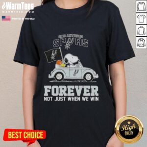 Alt Text: Snoopy driving a car in a San Antonio Spurs ladies tee, promoting team spirit with 'Forever, Not Just When We Win' slogan.