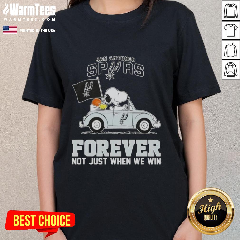 Alt Text: Snoopy driving a car in a San Antonio Spurs ladies tee, promoting team spirit with 'Forever, Not Just When We Win' slogan.