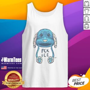 Travis Knight in a stylish ice blue beanie and tank top, showcasing a trendy urban outfit perfect for casual wear.