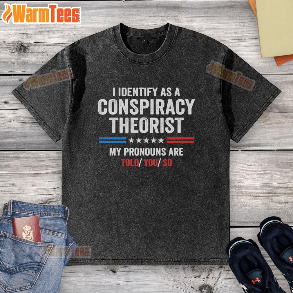 Alt Text: Official I Identify As A Conspiracy Theorist T-Shirt featuring 'My Pronouns Are Told You So' design in a casual style.