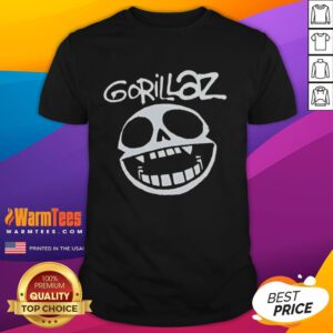 Alt Text: Stylish Gorillaz band skull logo t-shirt featuring vibrant colors and unique graphic design for music fans.