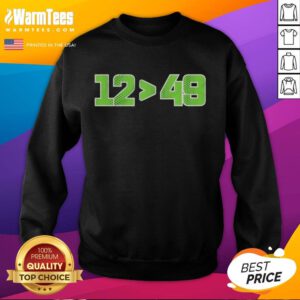 Top Seattle Seahawks 12 Defeated 49 sweatshirt featuring team colors and logo, perfect for fans showing support.