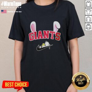 Official New York Giants x Snoopy Happy Easter ladies tee featuring a festive design perfect for fans celebrating Easter.