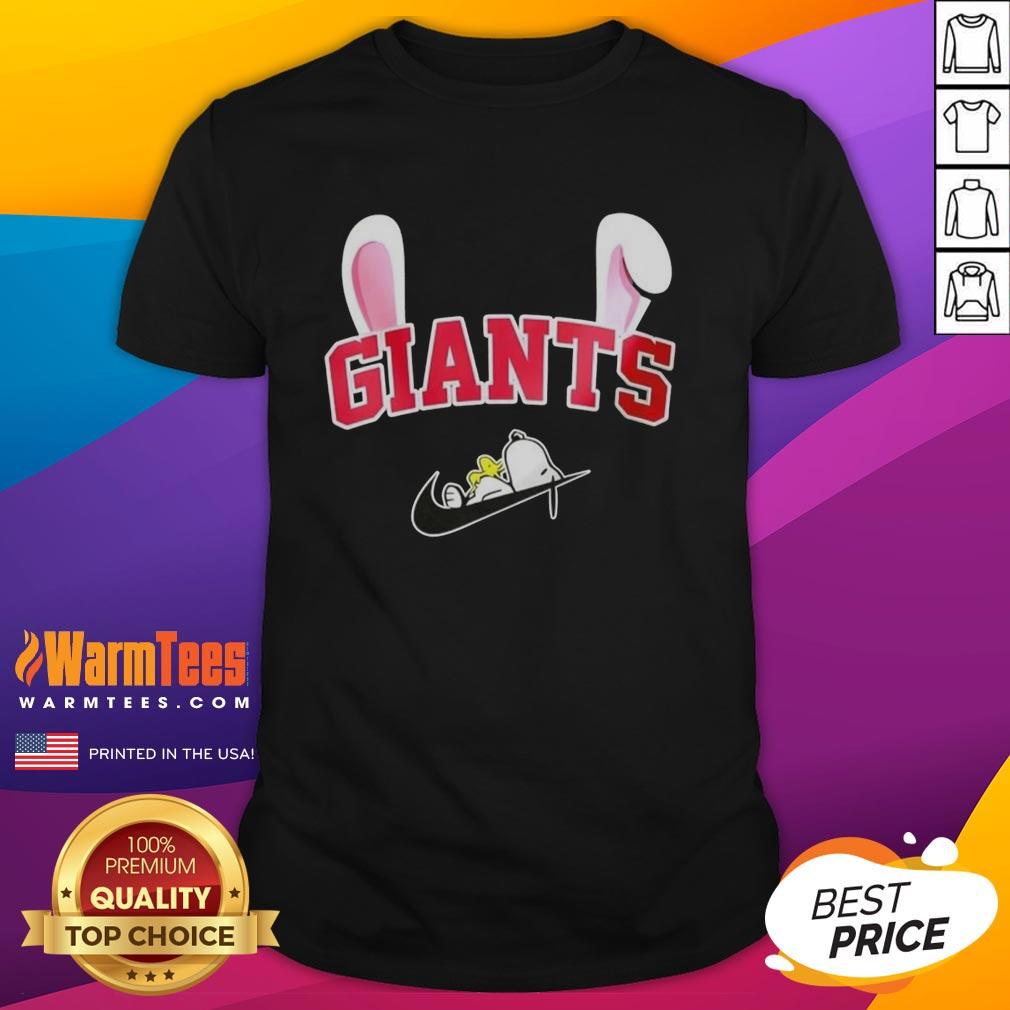 Alt Text: Official New York Giants X Snoopy Happy Easter T-Shirt featuring vibrant graphics and festive design for fans.