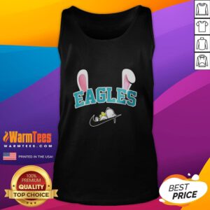 Official Philadelphia Eagles x Snoopy Happy Easter tank top featuring festive graphics for fans and holiday celebrations.