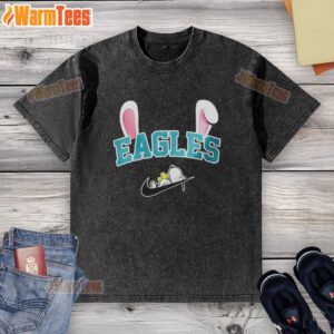 Official Philadelphia Eagles X Snoopy Happy Easter washed t-shirt featuring festive graphics for fans and collectors.