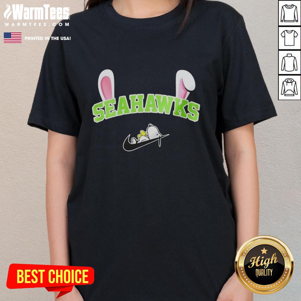 Alt Text: Official Seattle Seahawks x Snoopy Happy Easter ladies tee featuring festive design and team colors.