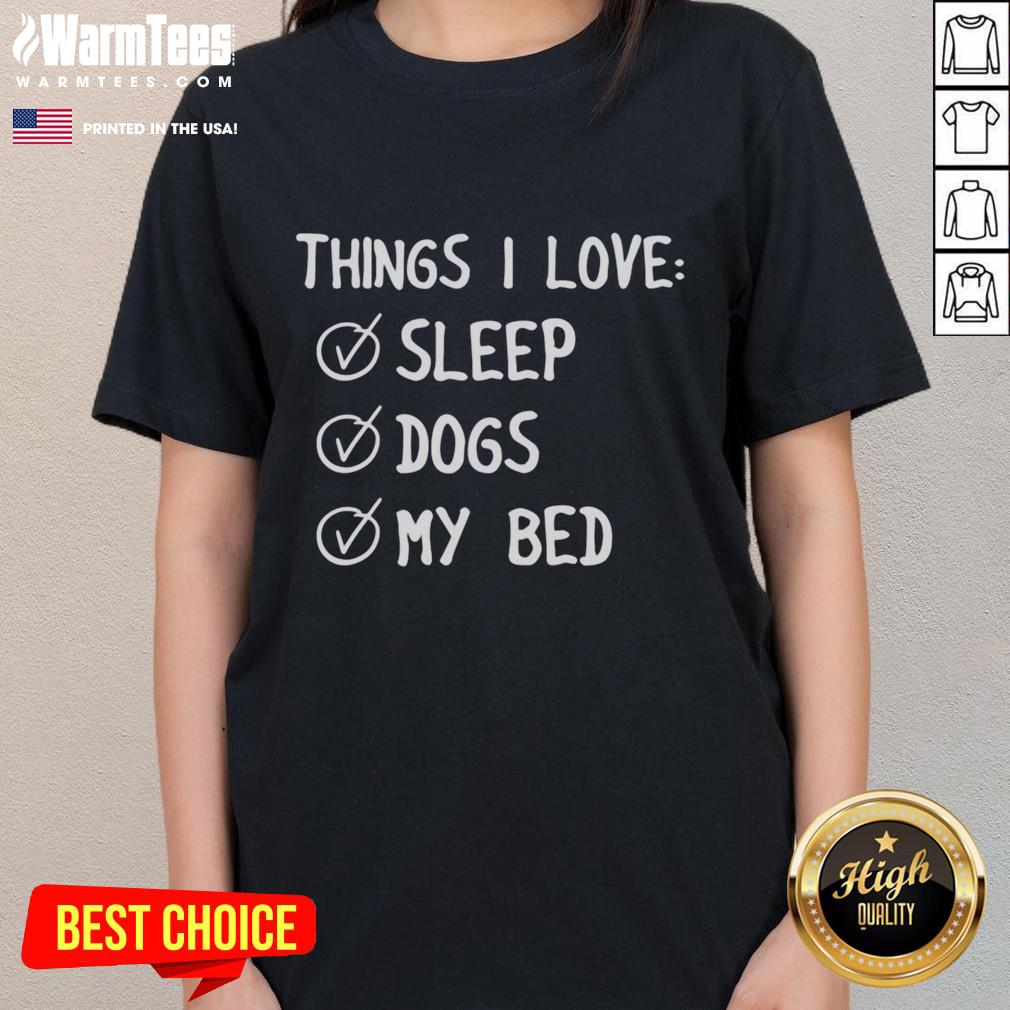 Official 'Things I Love: Sleep, Dogs, My Bed' Ladies Tee featuring playful graphics and comfortable fit.