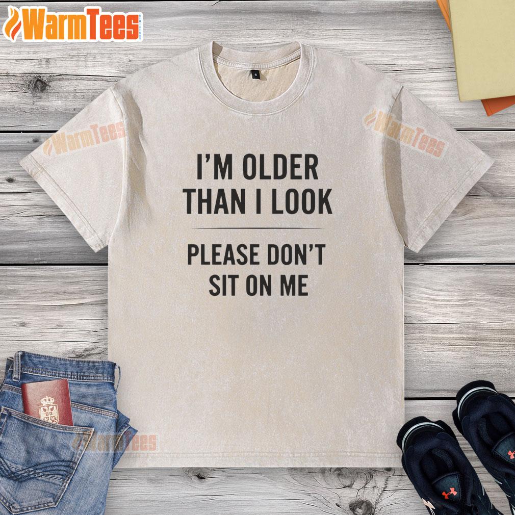 Funny 'I'm Older Than I Look' washed t-shirt design with humorous text, perfect for casual wear and gifting.