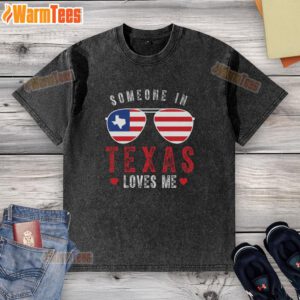 Alt Text: Champion washed t-shirt in Texas with 'Someone Loves Me' graphic, perfect for casual wear and gifts.