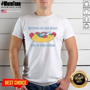 Alt Text: Person wearing 'Nice Hotdog In One Hand You In The Other' T-shirt, showcasing a fun food-themed design.