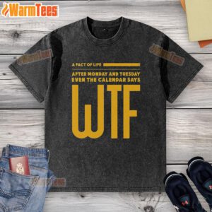 Pretty A Fact Of Life washed t-shirt displayed on a wooden background, showcasing its soft fabric and stylish design.
