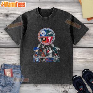 Awesome Philadelphia sports teams Snoopy t-shirt featuring 76ers, Eagles, Flyers, and Phillies logos in a washed design.