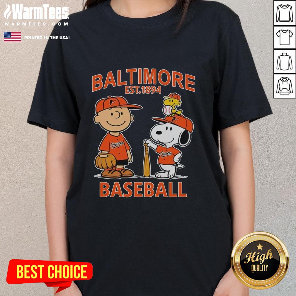 Alt Text: Cute Charlie Brown, Snoopy, and Woodstock wearing a Baltimore Orioles baseball jersey on a ladies tee, Est. 1894.