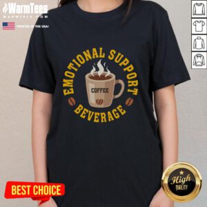 Women enjoying coffee in a cozy setting, showcasing the 'Good Coffee Emotional Support Beverage' tee.