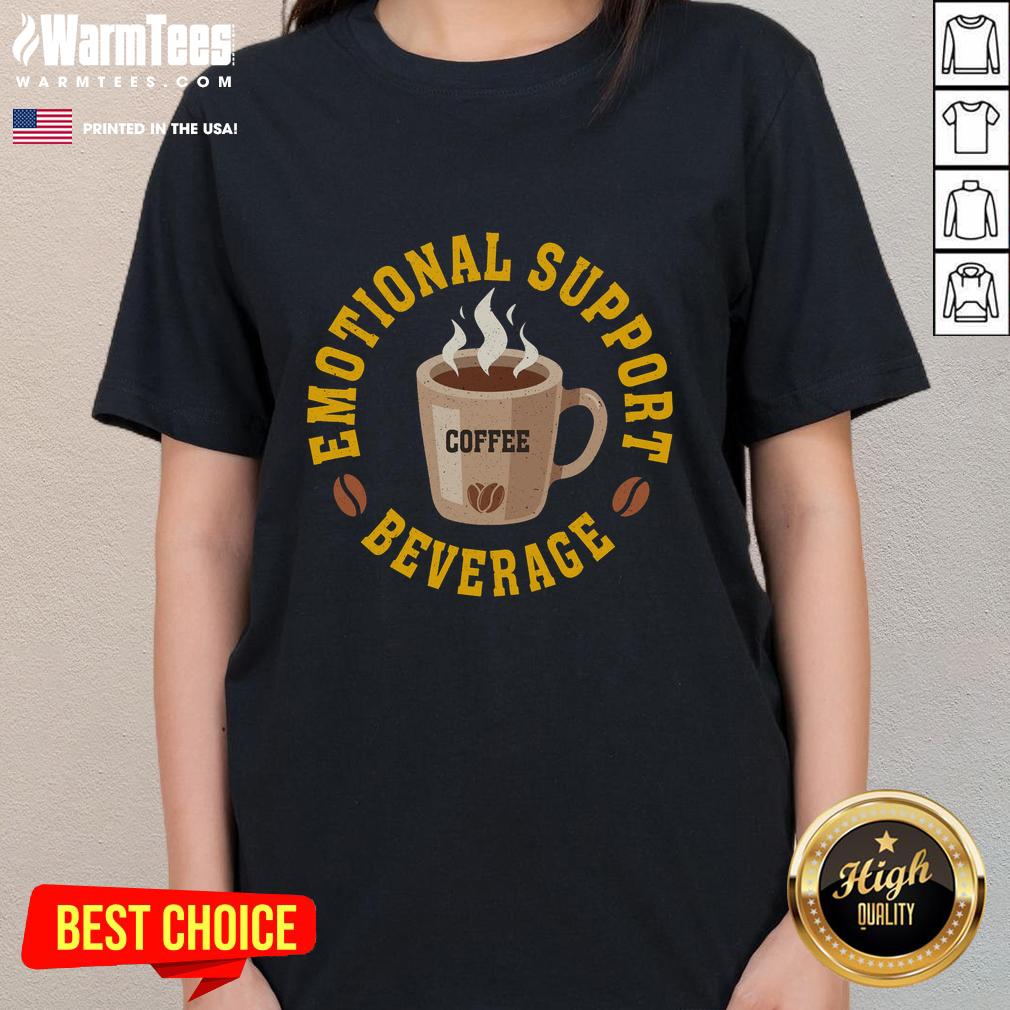 Women enjoying coffee in a cozy setting, showcasing the 'Good Coffee Emotional Support Beverage' tee.