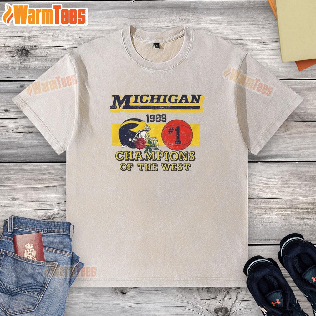 Vintage washed t-shirt featuring the 1989 NCAA Michigan Wolverines Champions of the West logo.