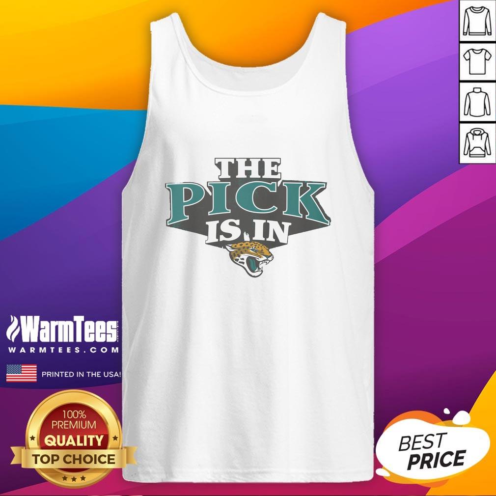 Alt Text: Hot Jacksonville Jaguars fan wearing a tank top celebrates after the team's pick is in during the NFL draft.
