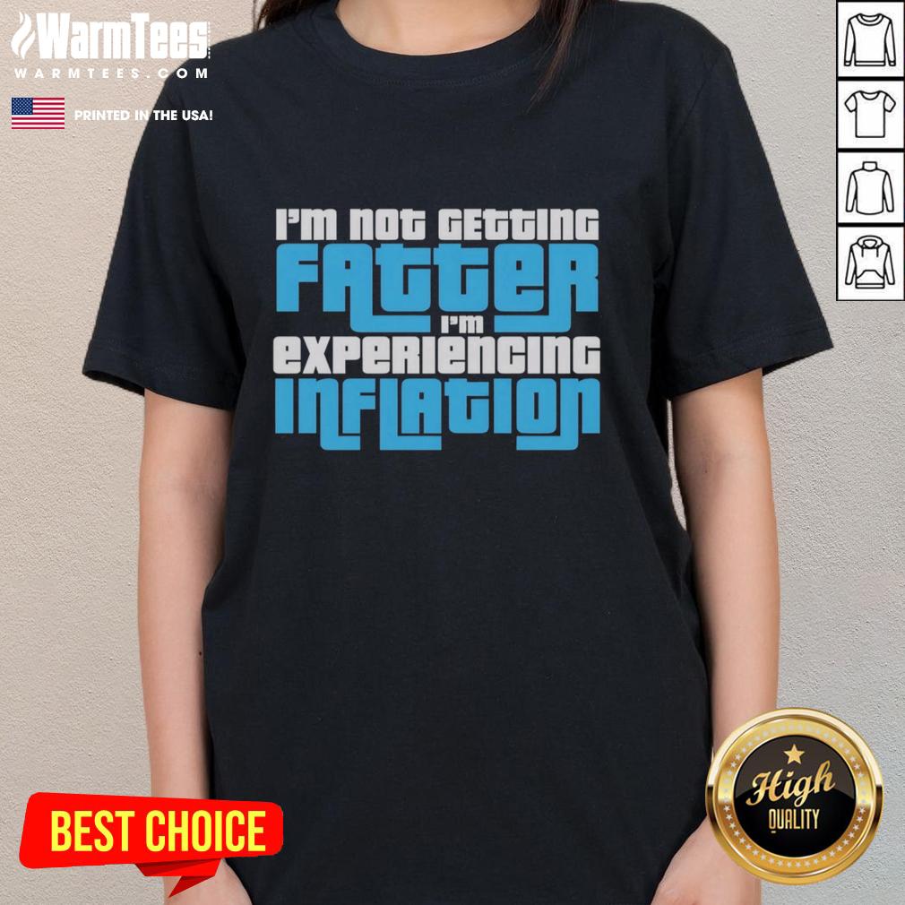 Funny 'I'm Not Getting Fatter, I'm Experiencing Inflation' ladies tee in vibrant colors, perfect for casual wear.