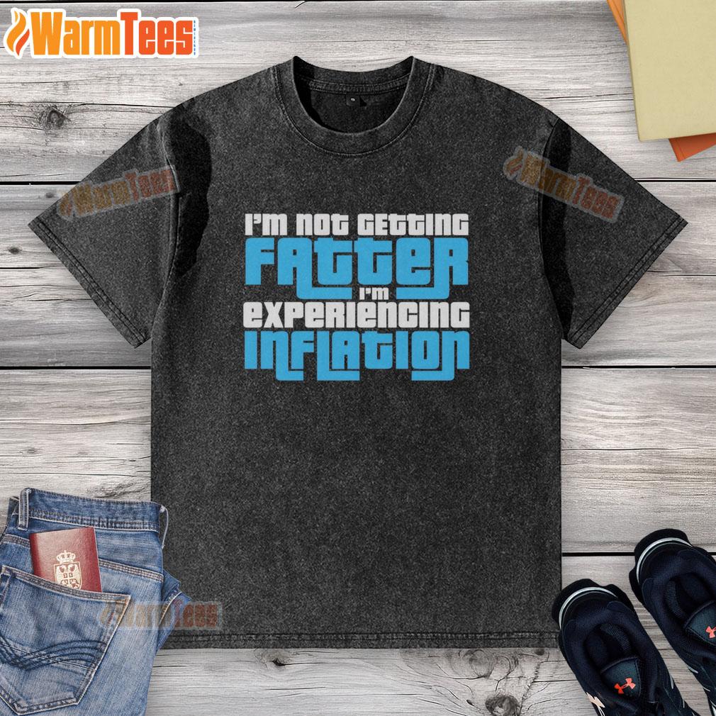 Funny washed t-shirt with 'I'm not getting fatter, I'm experiencing inflation' slogan, perfect for humor lovers.
