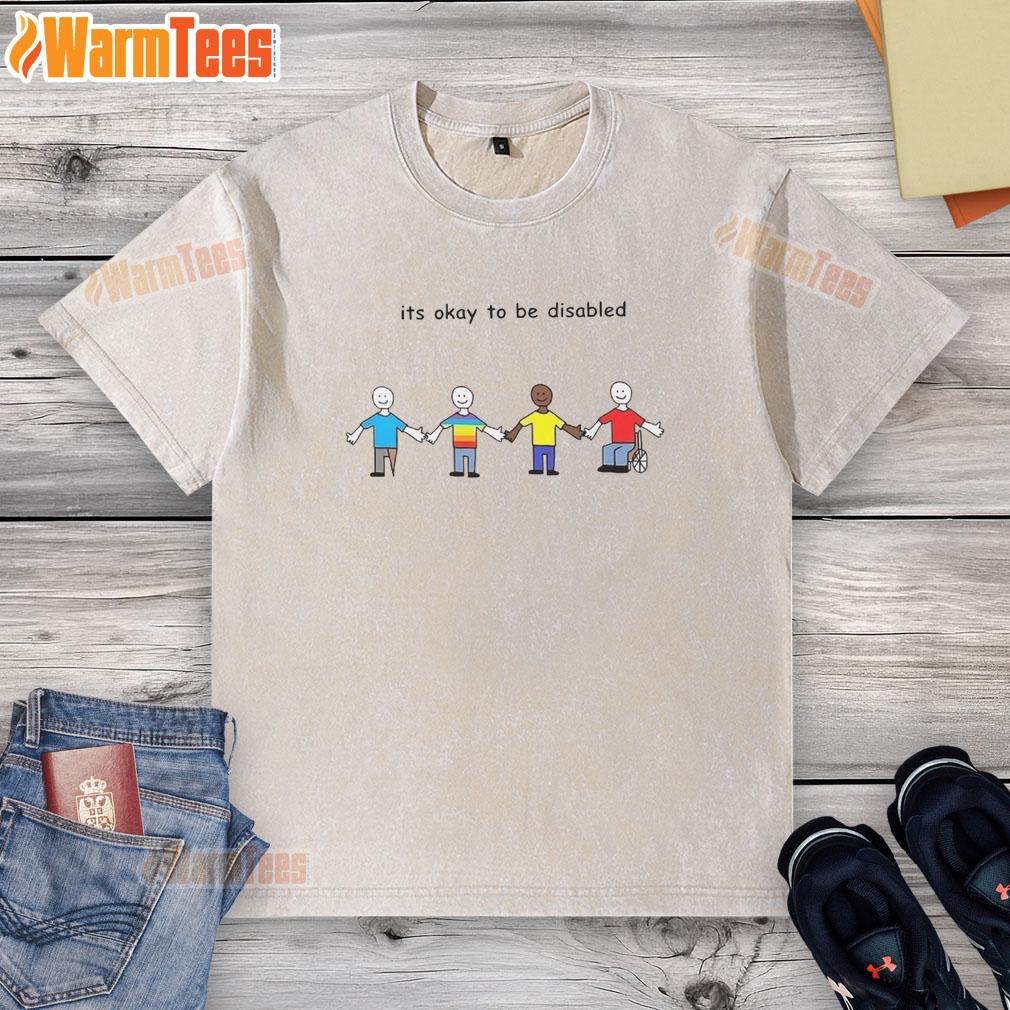 Cartoon design on a washed t-shirt with 'It's Okay to Be Disabled' message, promoting disability acceptance and awareness.