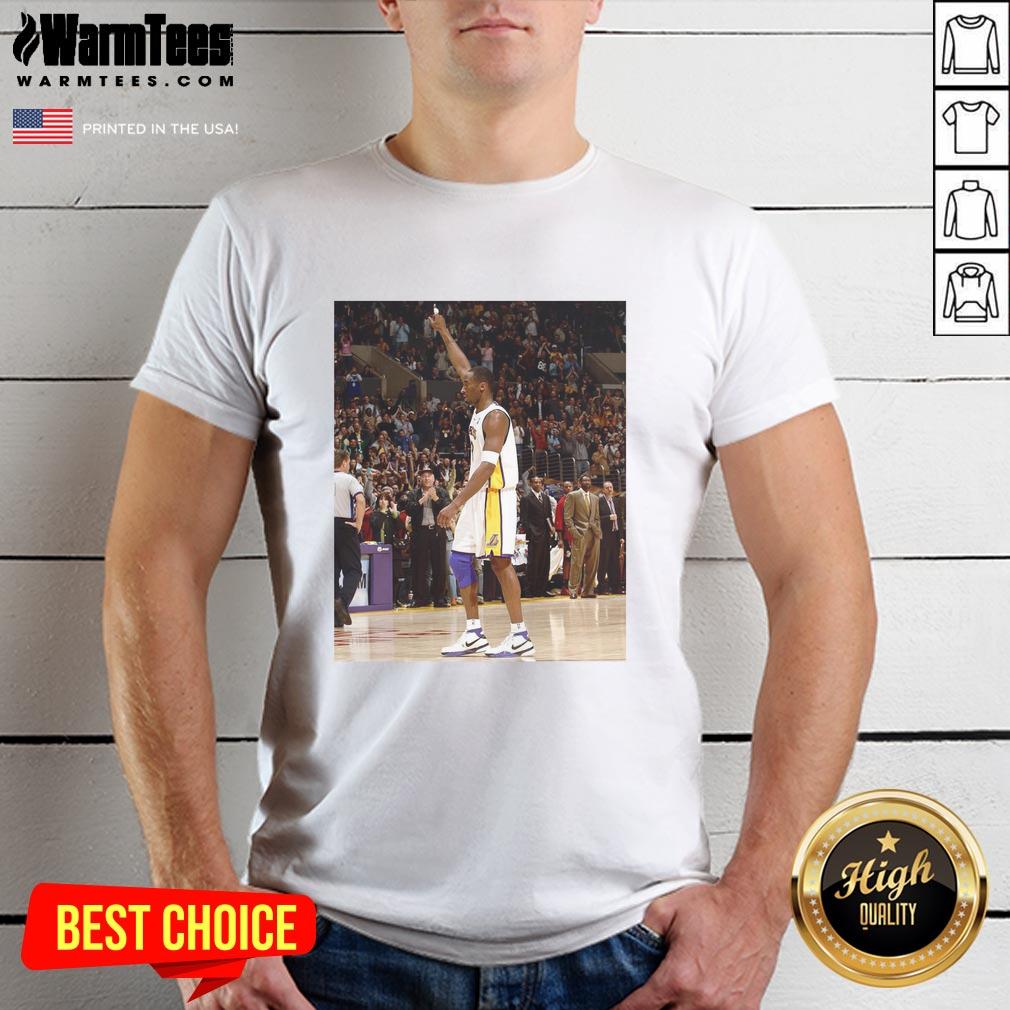 Alt Text: Pau Gasol smiling while wearing a Kobe Bryant T-shirt, showcasing his admiration for the Lakers legend.
