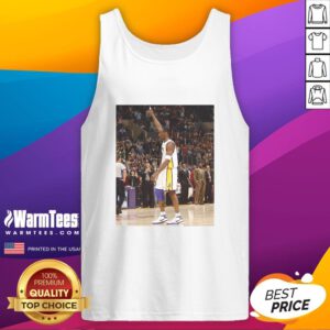 Pau Gasol wearing a Kobe Bryant tank top, showcasing his support for the Lakers legend during a casual outing.