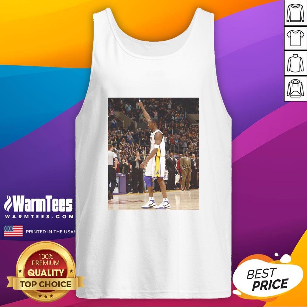 Pau Gasol wearing a Kobe Bryant tank top, showcasing his support for the Lakers legend during a casual outing.