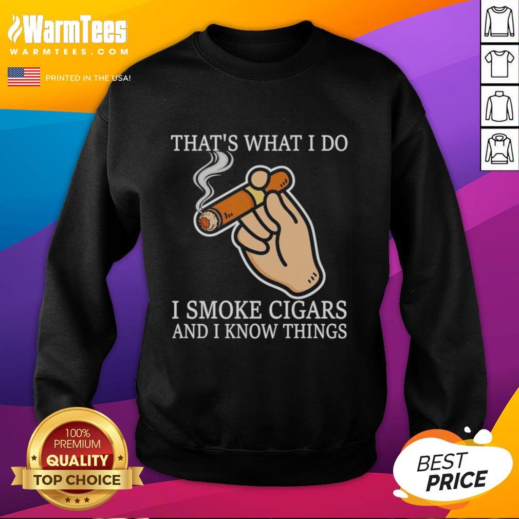 Nice sweatshirt featuring 'That's What I Do I Smoke Cigars And I Know Things' design, perfect for cigar enthusiasts.