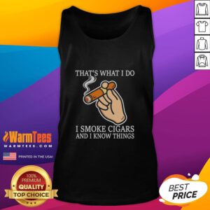 Person wearing a 'Nice, That's What I Do, I Smoke Cigars and I Know Things' tank top, showcasing a stylish casual look.