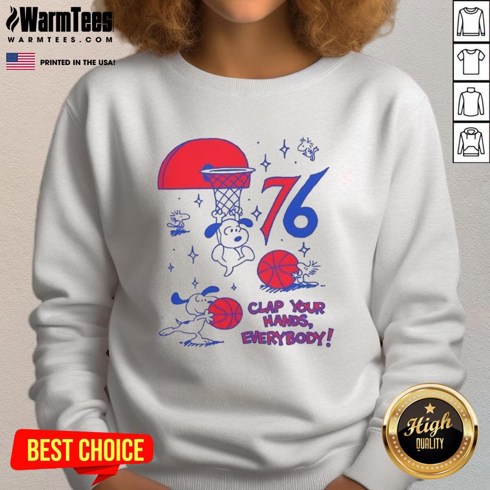 Original Philadelphia 76ers X Snoopy and Woodstock 'Clap Your Hands Everybody' sweatshirt featuring vibrant team colors.