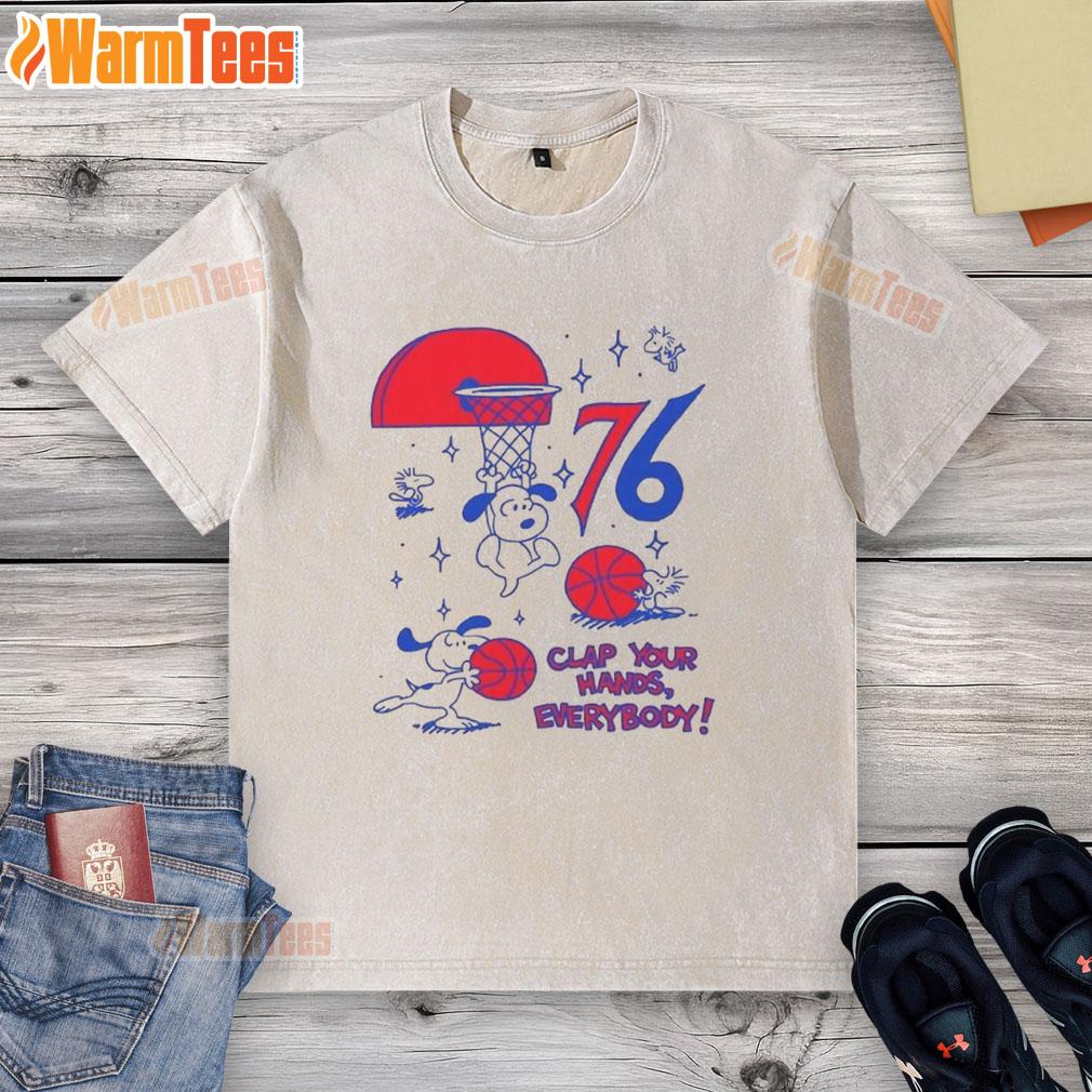 Original Philadelphia 76ers X Snoopy and Woodstock 'Clap Your Hands' T-Shirt featuring vibrant graphics.
