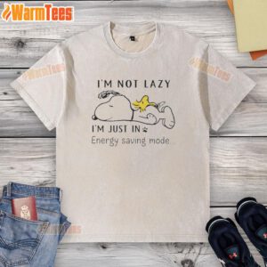 Alt Text: Cozy washed T-shirt featuring Snoopy and Woodstock sleeping with the phrase I'm not lazy, I'm just in energy saving mode.