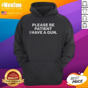 Nice Please Be Patient I Have A Gun hoodie displayed in a stylish setting, showcasing its unique design.