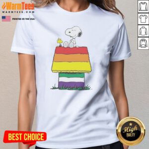 Snoopy Peanuts Happy Pride Month ladies tee featuring vibrant colors and a playful design.